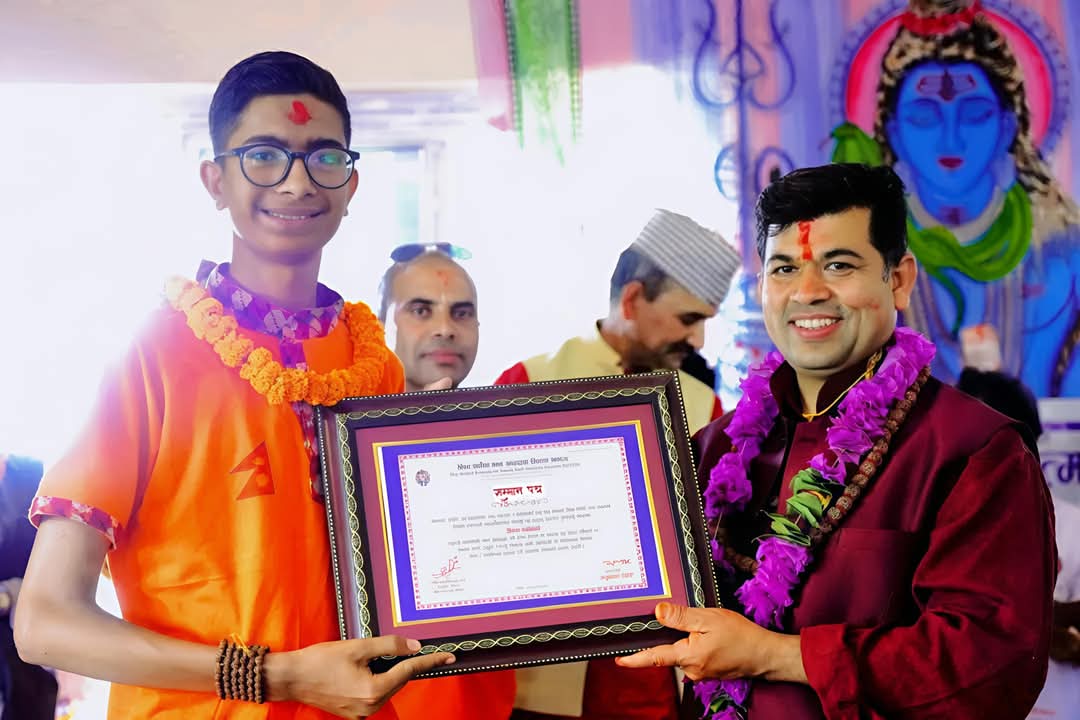 Prince receiving an award certificate