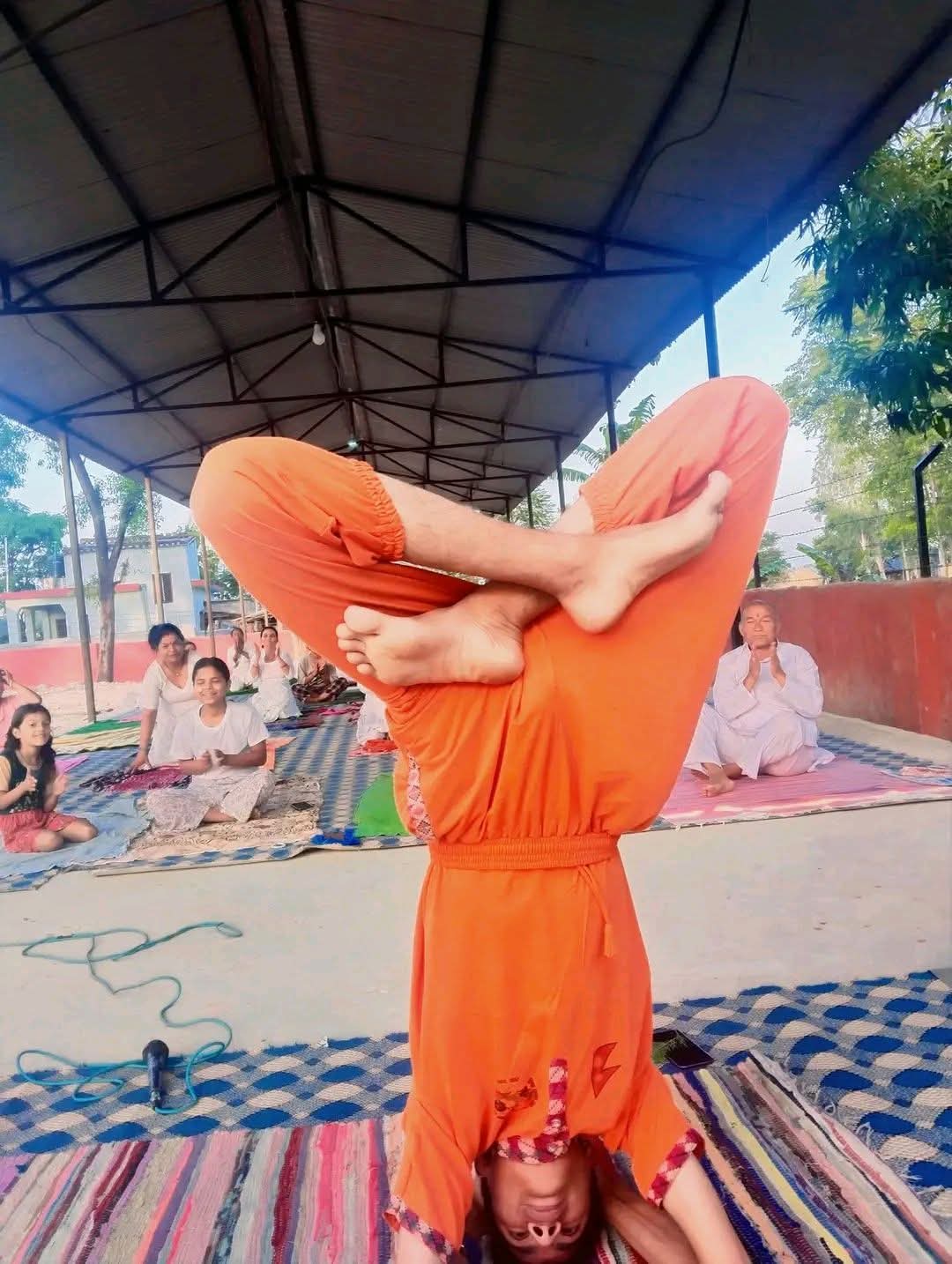 Yogi Prince Neupane performing an advanced yoga posture