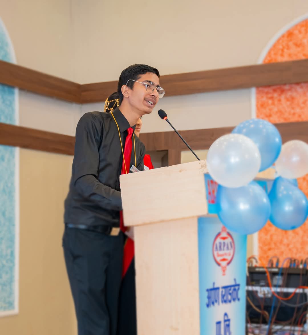 Prince speaking at a public event